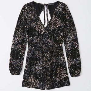 Long sleeve open back romper